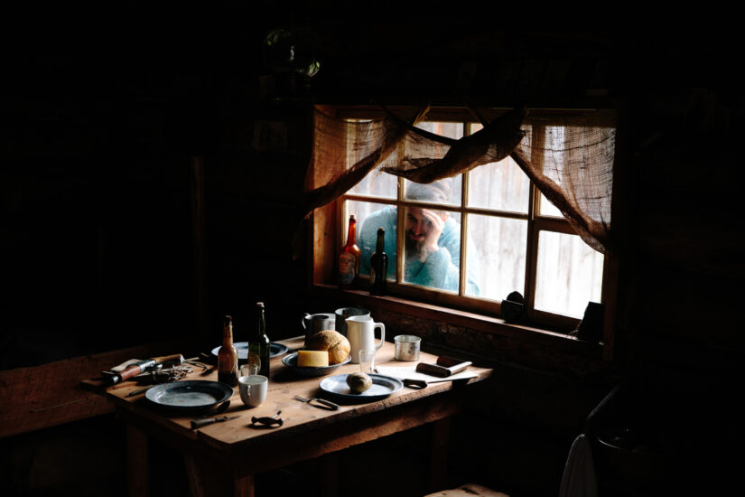 peeking inside a cabin window