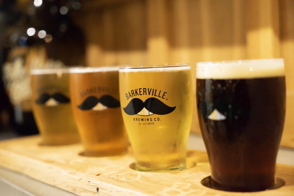A flight of beer with moustaches at Barkerville Brewing Co
