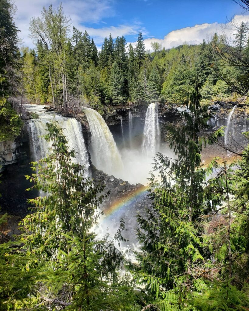 Rainbow over a waterfall.